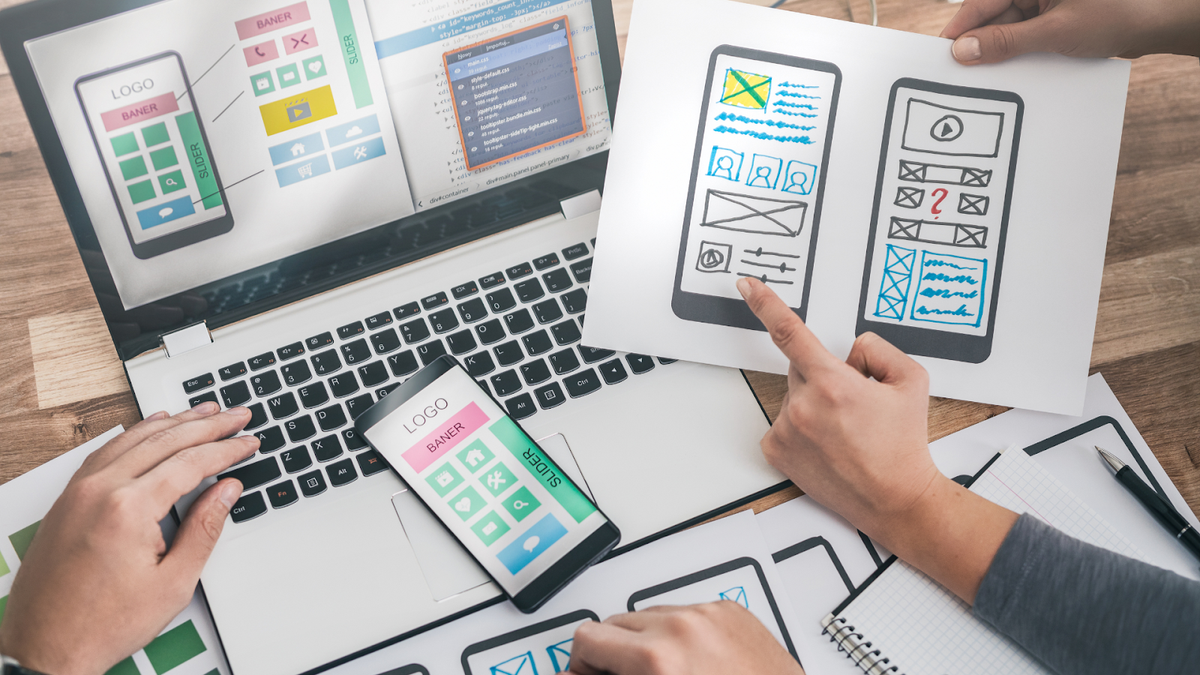 Designers conceptualizing website UX app development